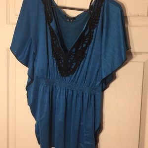 Blue shirt with black lace